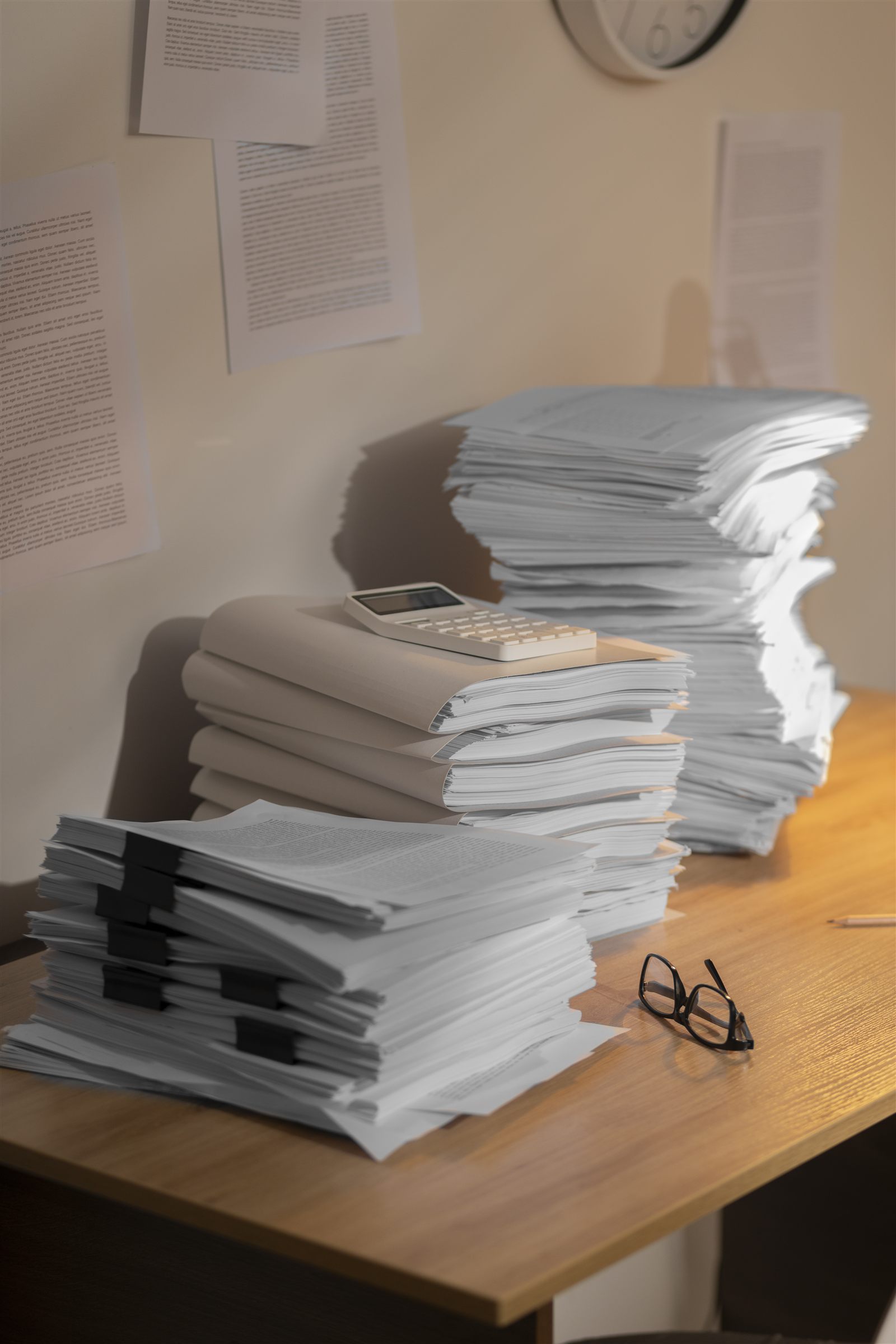 Stacks of prepared documents on a desk
