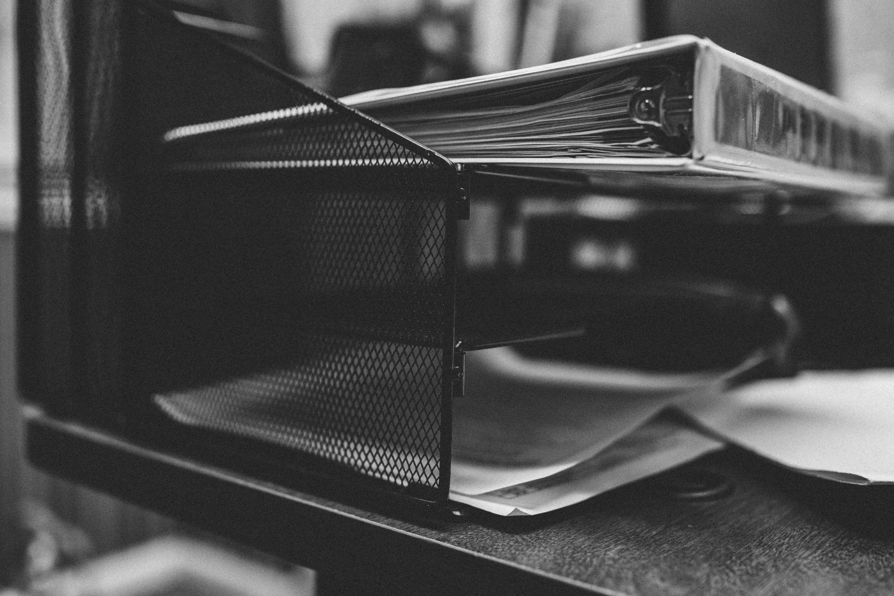 Stacked folders and papers in close-up