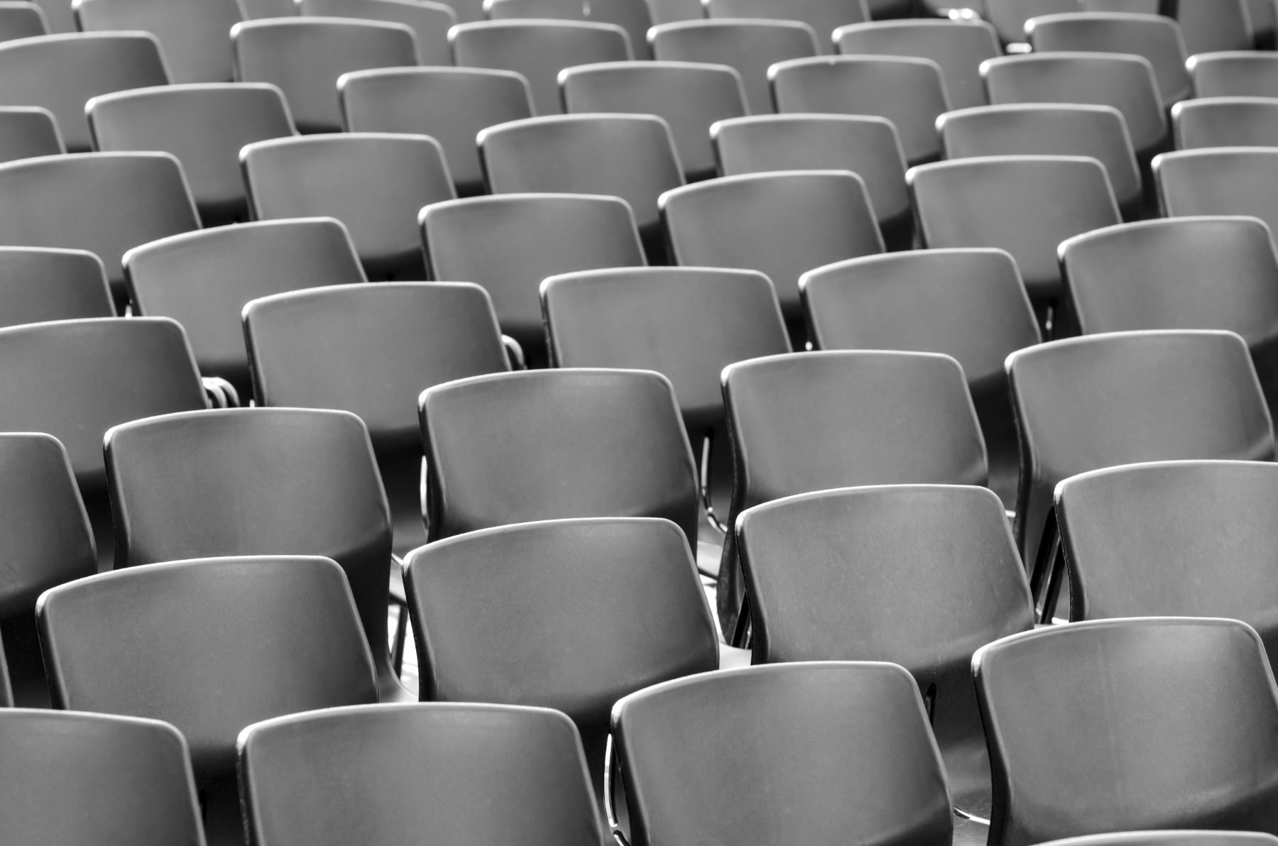 A long row of grey chairs